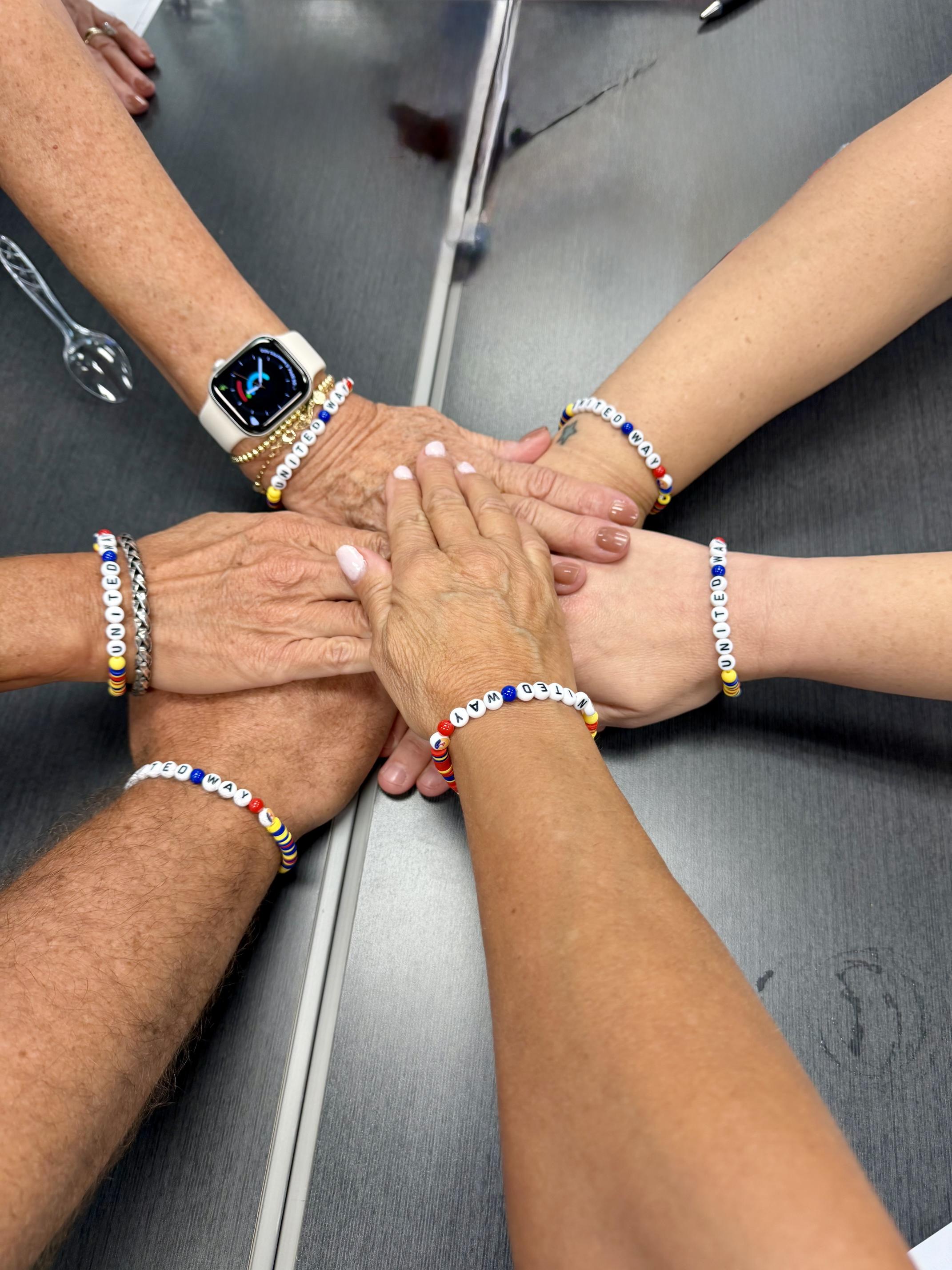 United Way supporters joining hands