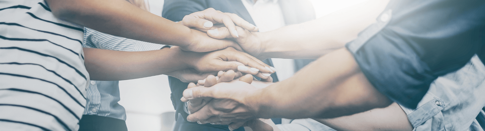 group holding hands